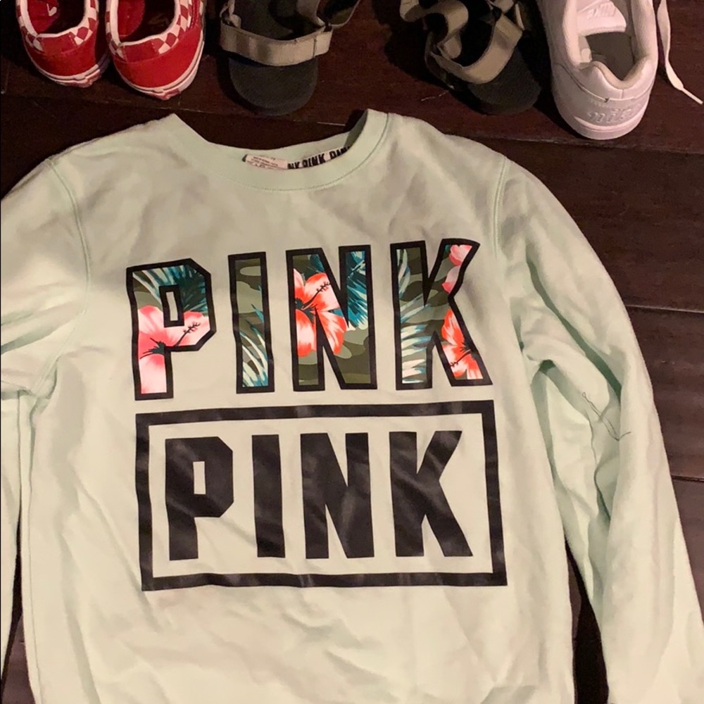 A pink brand sweater !